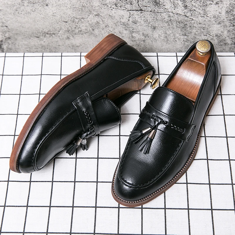 Vicente | Mocasines de piel con borlas