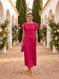 Martina | Vestido largo plisado y elegante con lazada en la cintura